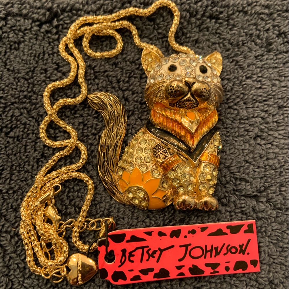 On sale! BJ rhinestone cat with gold and orange. Drop is 12”.